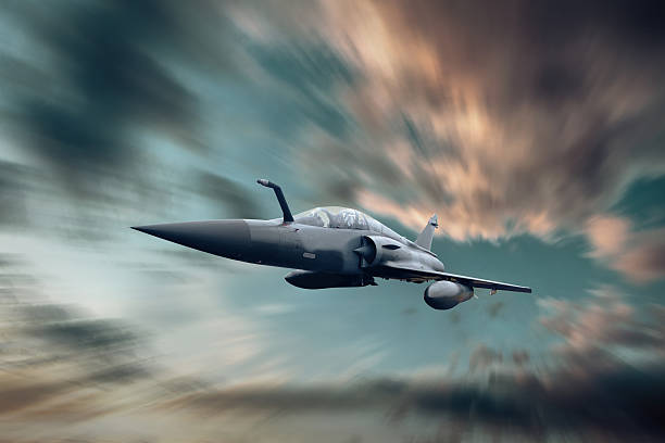 istock Military airplan on the speed in the sky 623864794