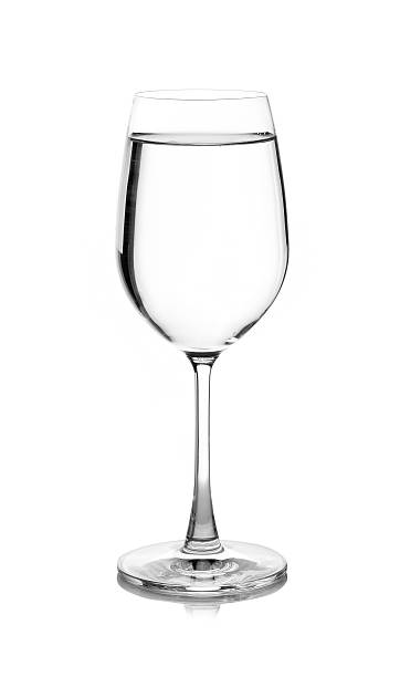 istock water in glass. Isolated on white background 623865594