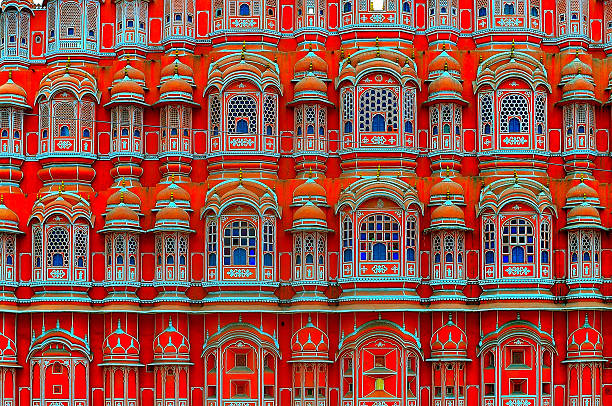 Windows of Hawa Mahal This close-up image of the windows or jharokhas of Hawa Mahal shows the immense talent of the Indian architects,masons, and craftsmen in the 18th.century. jaipur stock pictures, royalty-free photos & images