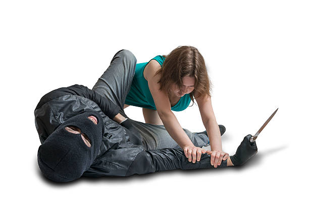 istock Woman is fighting with thief. Self defense concept. Isolated. 623868200