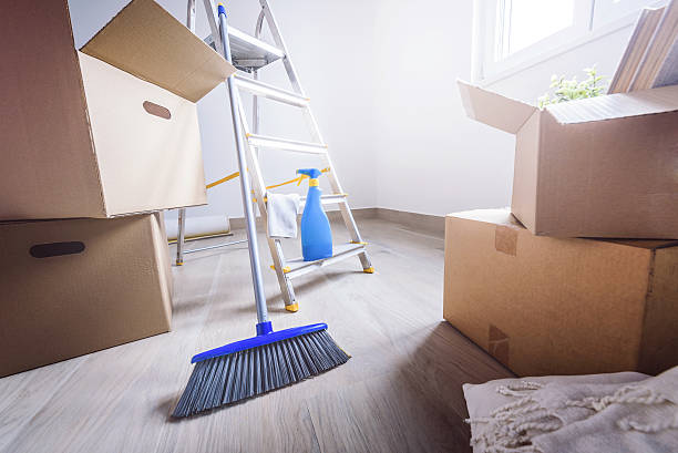istock Cardboard boxes and cleaning things for moving into new home 623877874