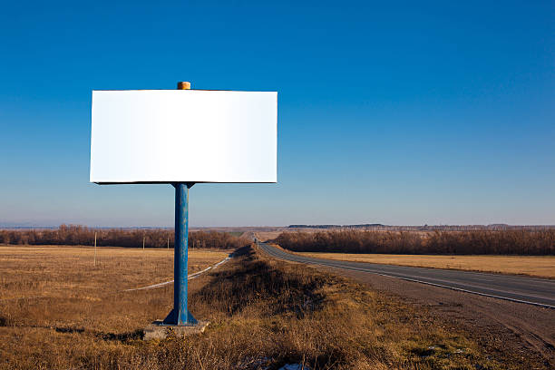 istock billboard in a field near the road 623879410