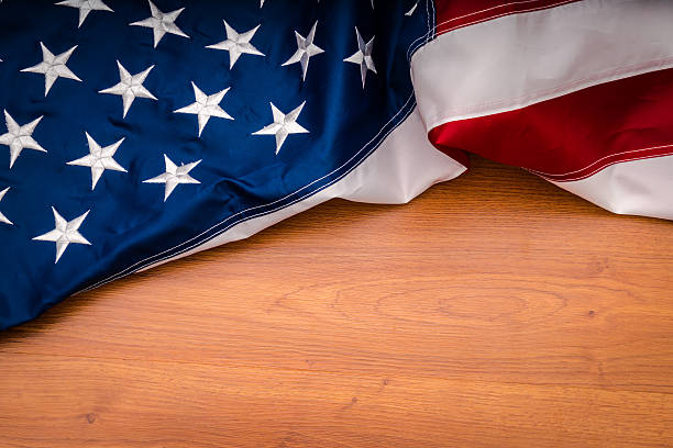 istock American flag on a wooden background 623881282
