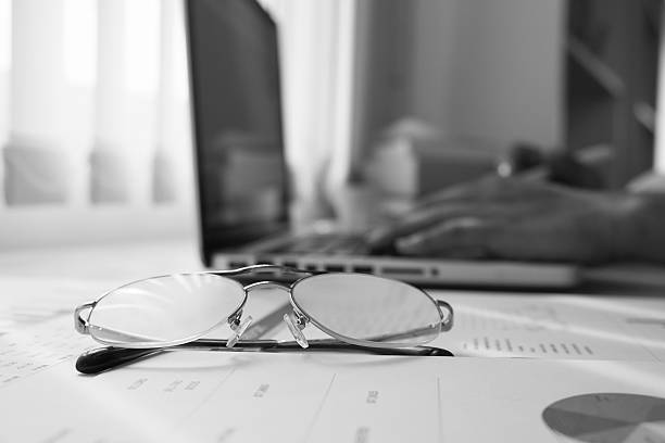 focus at glasses and background of meeting room,monochrome black - whitek imagens e fotografias de stock