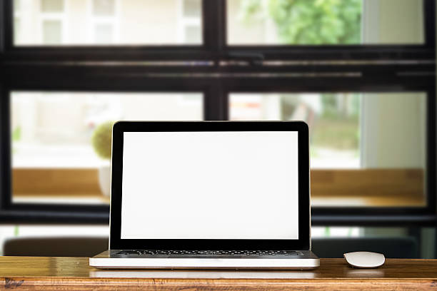 istock notebook or laptop and mouse on wood desk against the 623885884