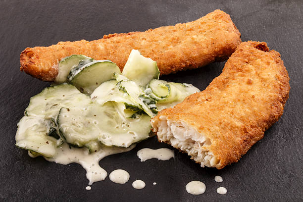 lightly coated whiting fillets and cucumber salad