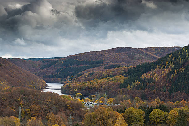 istock Dark clouds above the National Park in The Eifel, Germany. 623889418