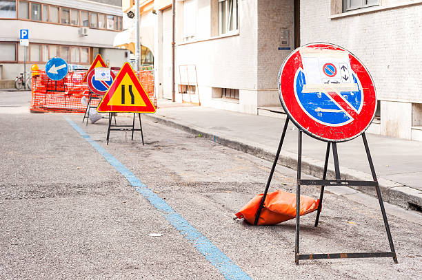 istock No parking sign post for road works. 623896498