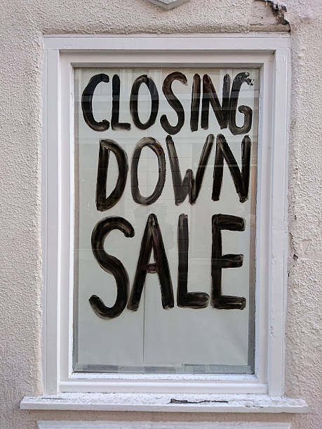 istock 'Closing Down Sale' sign in a window. 623896716