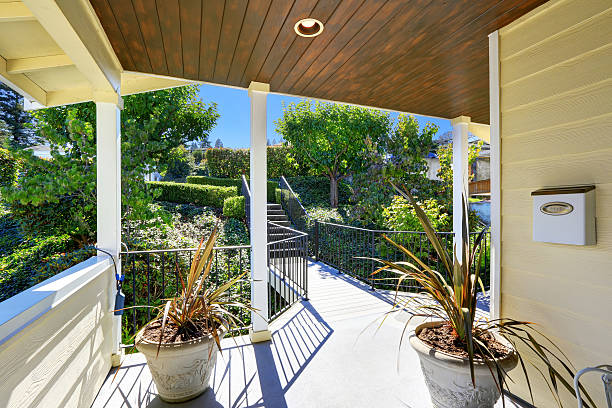 istock View of walkway bridge surrounded by bushes and trees 623899240