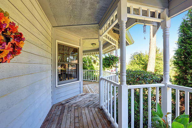 istock Long balcony home exterior with white railings and perfect view 623906772
