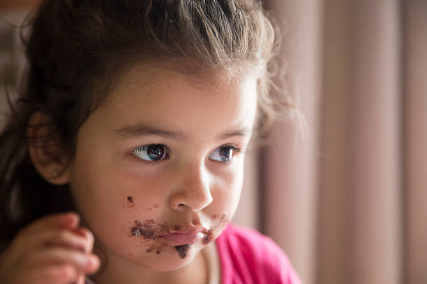 istock Girl with dirty mouth 623906796