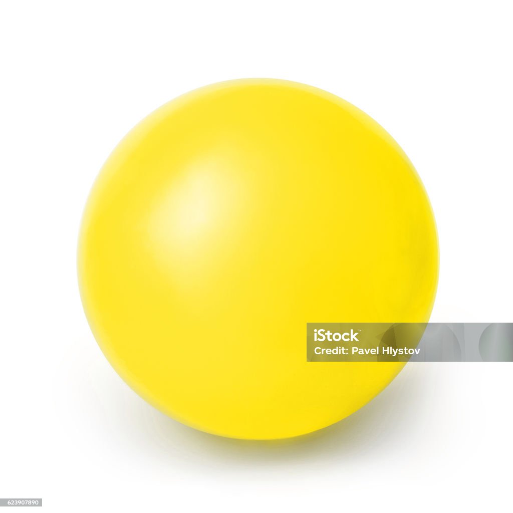 Foto de Bola Amarela Isolada Em Um Fundo Branco e mais fotos de