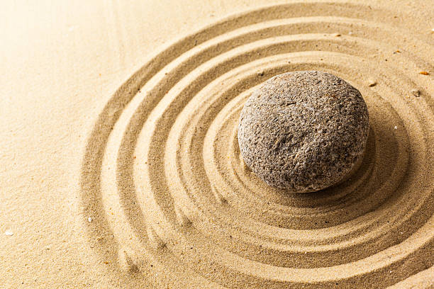 istock zen garden meditation stone background 623908242