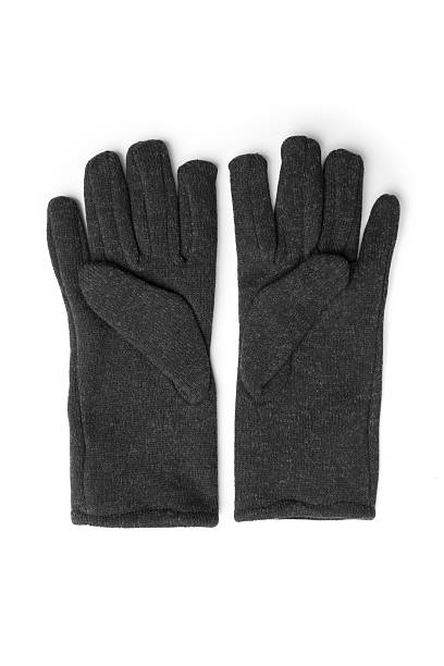istock Woman`s black gloves on white background 623908432