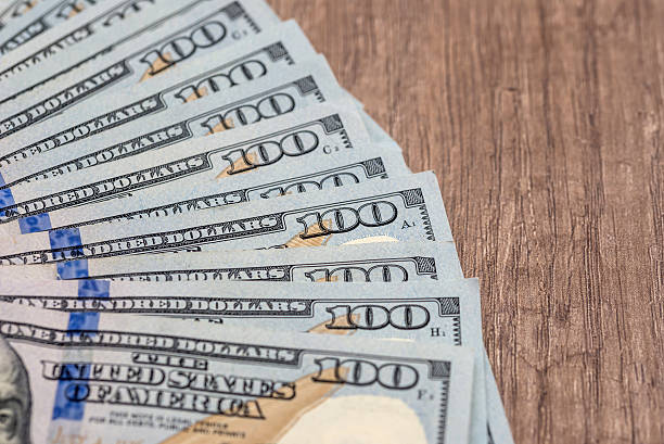 istock Heap of dollars as texture 623910740