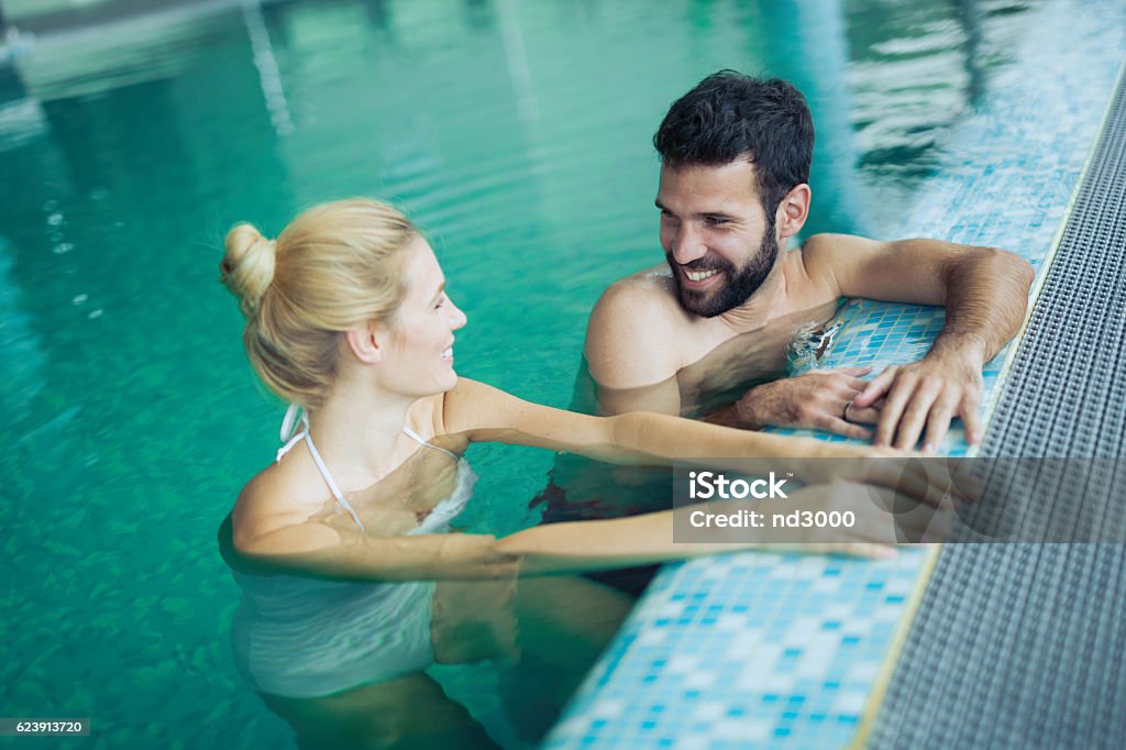 Romantic couple enjoying thermal bath Romantic couple enjoying thermal bath spa and wellness center Hot Spring Stock Photo