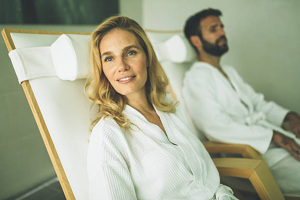 istock Beautiful woman relaxing in bathrobe 623919464