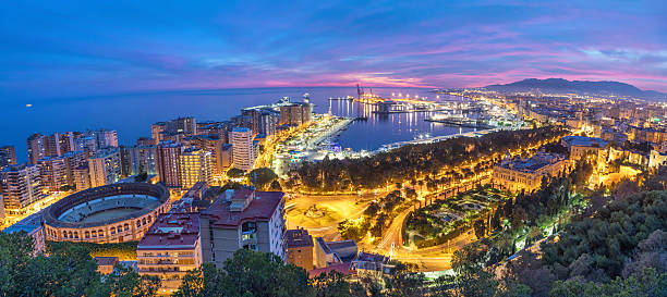 Panorama of sea coast in Malaga on sunset Panorama of sea coast and port in Malaga on sunset, Andalusia, Spain málaga province photos stock pictures, royalty-free photos & images