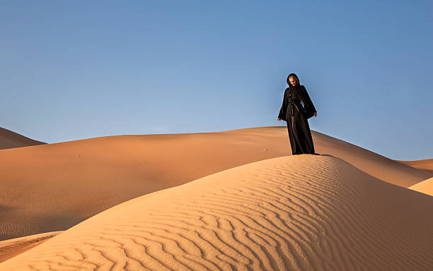 istock Woman in an abaya in deseert 623925700