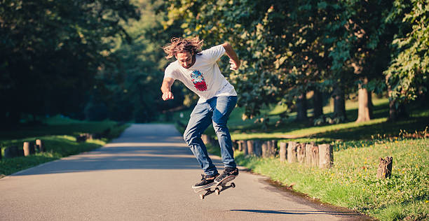 istock Action shot of a skateboarder skating, doing tricks and jumping 623930214