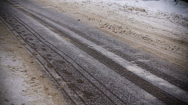 istock Snow roads, snow on asphalt, rural roads 623931212