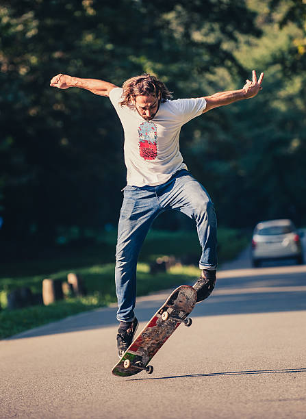 istock Action shot of a skateboarder skating, doing tricks and jumping 623931330