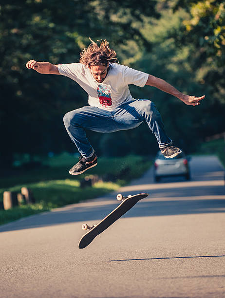 istock Action shot of a skateboarder skating, doing tricks and jumping 623931604