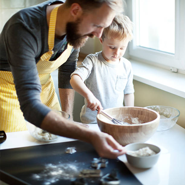 istock Father cooking with his son 623940684