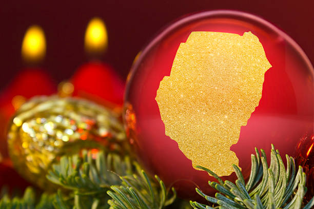 istock Red bauble with the golden shape of Sudan.(series) 623943920