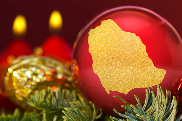istock Red bauble with the golden shape of Saudi Arabia.(series) 623956042