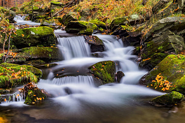 istock View of autumn waterfalls 623957948