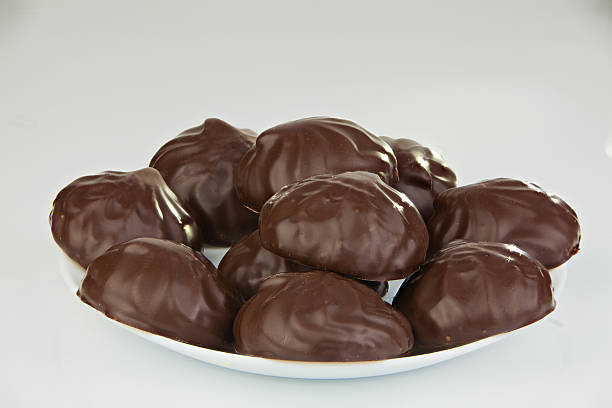 istock Delicious chocolate marshmallow on plate on white 623959654