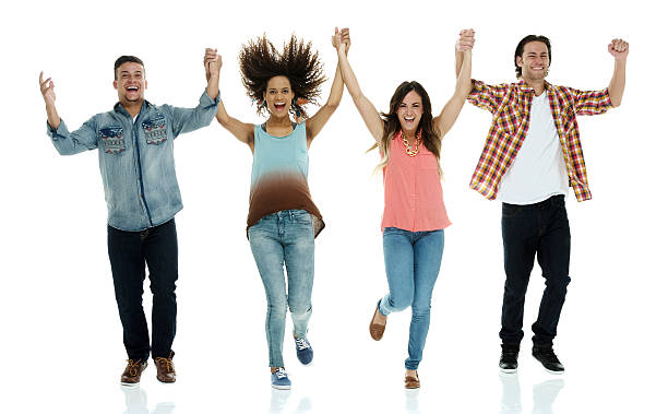 istock Smiling friends holding hands and cheering 623963908