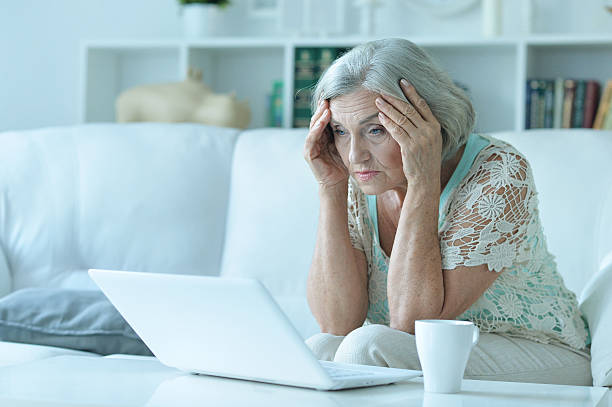 istock Senior woman  with laptop 623965404