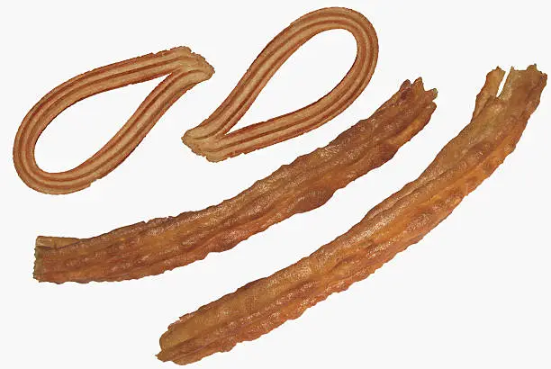 Photo of Porras and churros isolated over white