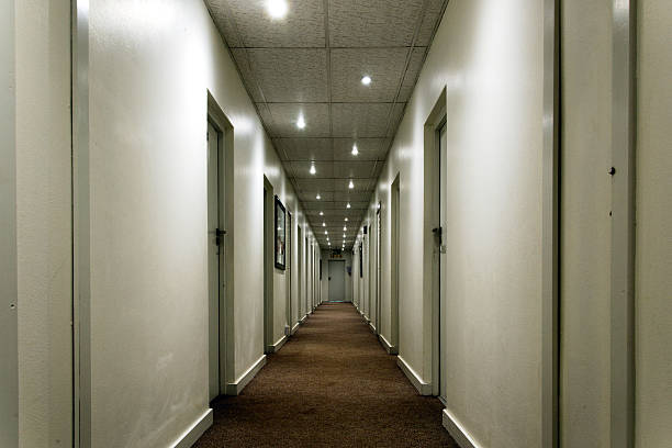 hallway in a hotel emphasizing perspective and lines stock photo