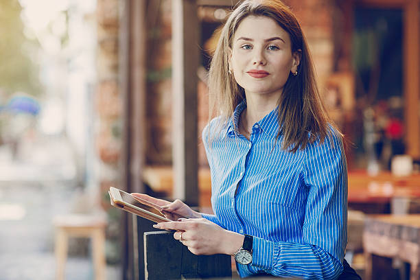 istock girl in cafe 623980838