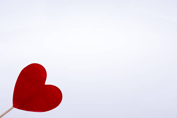 istock Red heart shape at the top of a stick 623984824