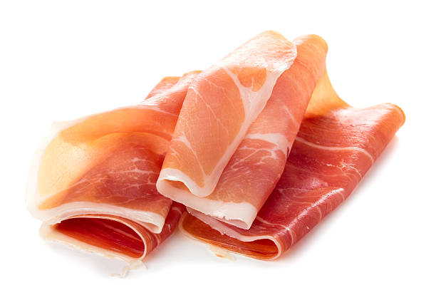 Sliced of jamon Sliced of jamon isolated on white background prosciutto stock pictures, royalty-free photos & images