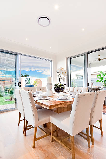 istock Modern dining table set up with chairs and wooden tables 623998460