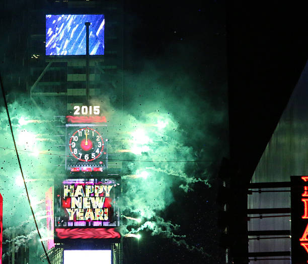 Happy New Year Times Square 2015 The ball drops in Times Square on New Years Eve 2015. Happy New Year. times square new years eve stock pictures, royalty-free photos & images