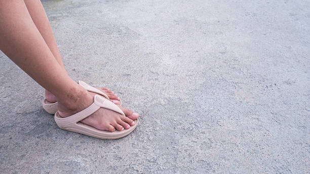 istock woman feet with sandal. 624006916