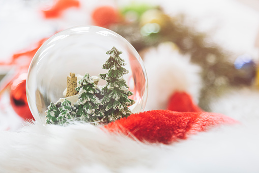 christmas ornaments with snow globe,studio shot.