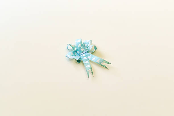 istock blue bow ribbon isolated on the white background 624008904