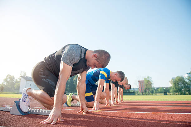 istock Runners preparing for race at starting blocks 624010546