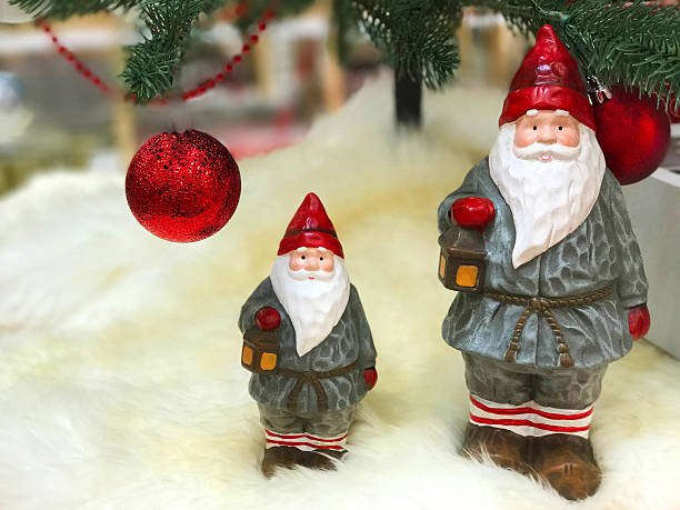 istock Santa Claus doll under christmas tree 624011842