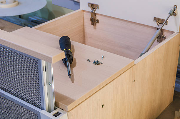 istock The assembly of kitchen furniture 624012548