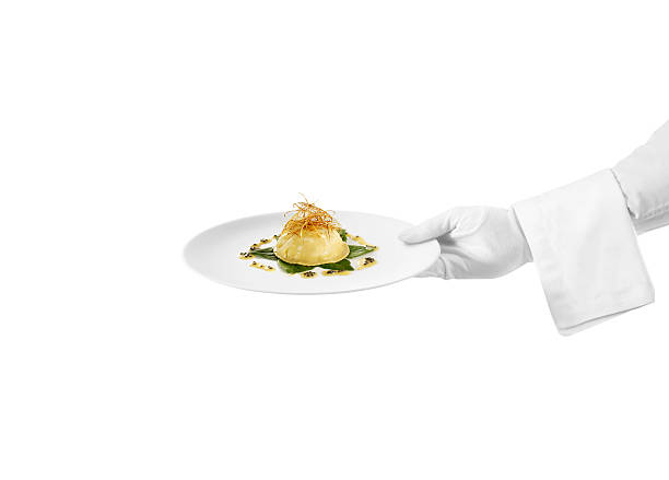 Serving Foie Gras detail of a waiter serving Foie Gras formal glove stock pictures, royalty-free photos & images