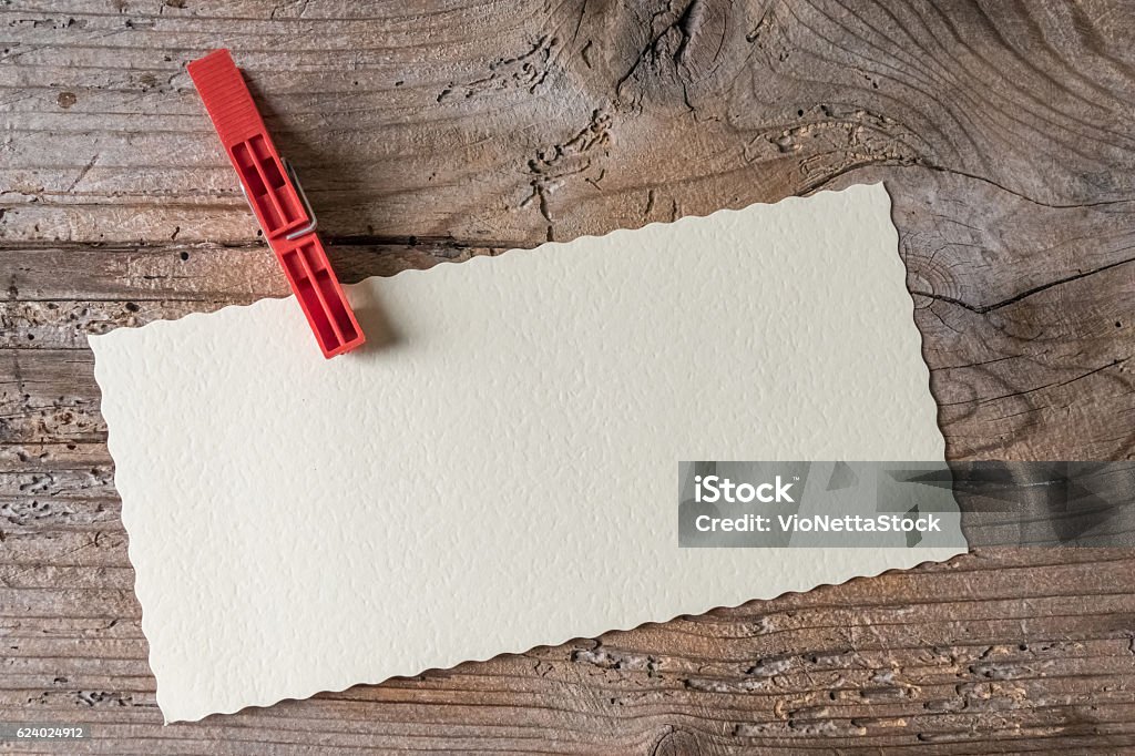 Empty paper sheet, top view Closeup of blank postcard over wooden background Backgrounds Stock Photo